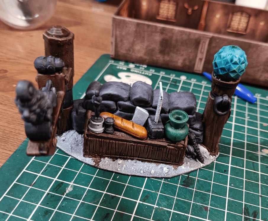 Wall decorated with baguette, Oscar, Thor's hammer, and boat figurehead