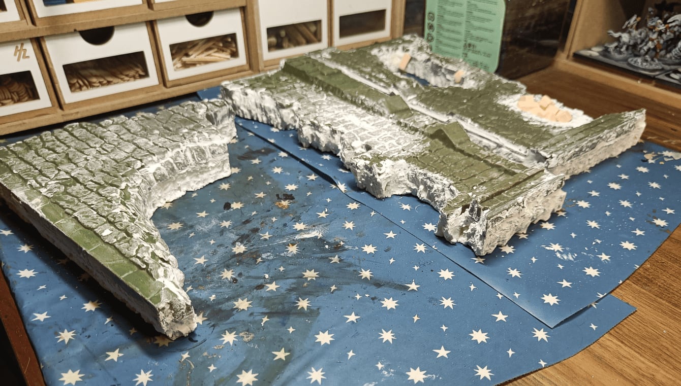 Platform showing spackle smoothing seams between plastic and foam