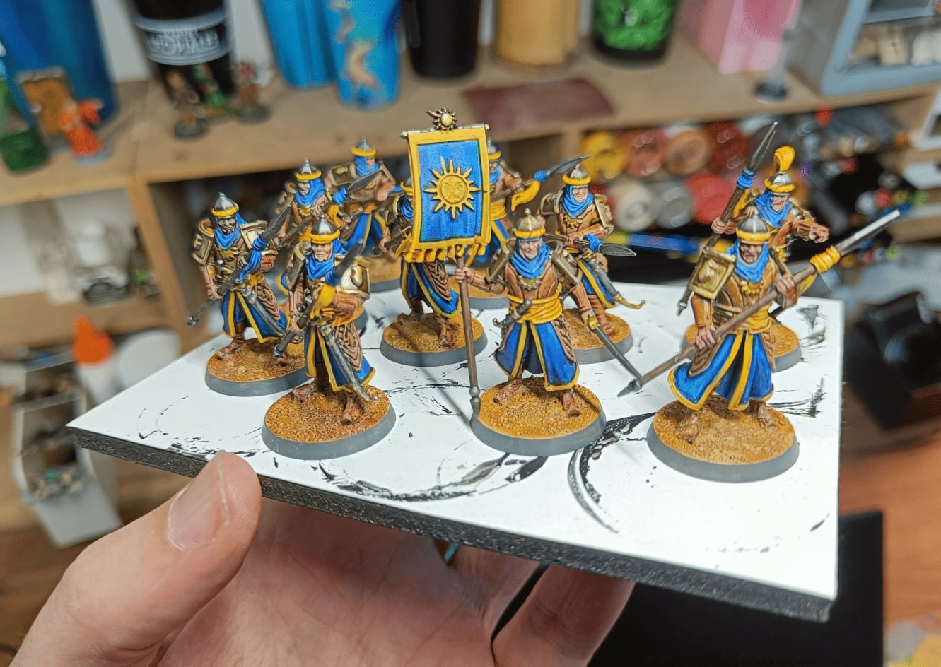Finished Qadira guards painted in blue and yellow Sarenrae colors