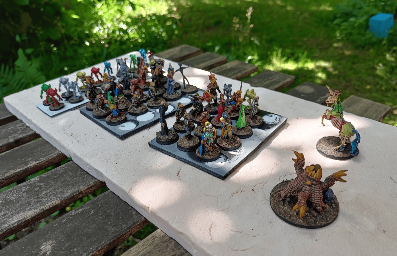 Mix of painted miniatures from various game systems testing speedpaints