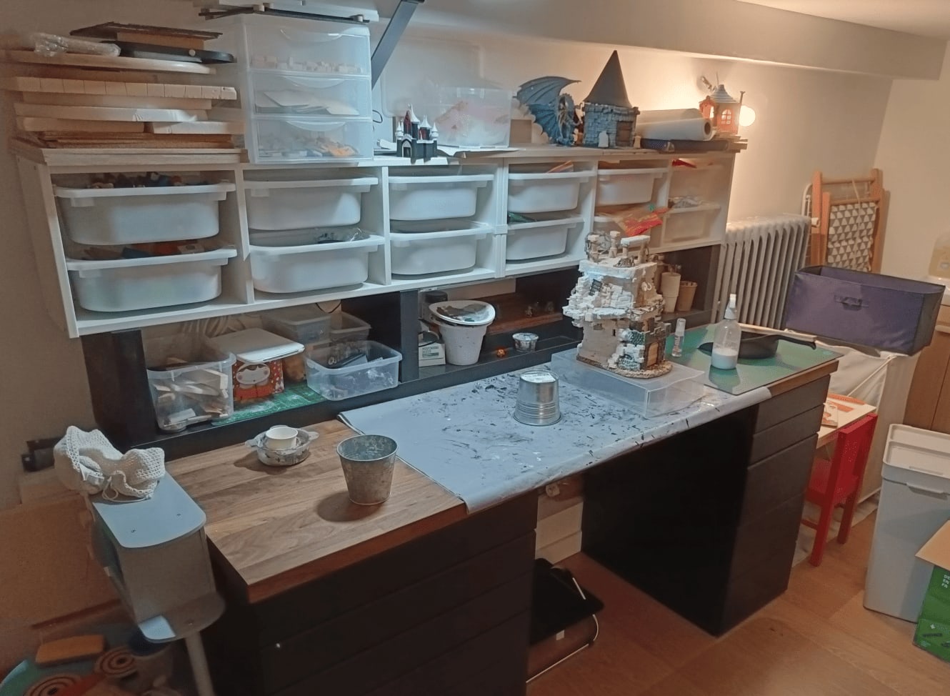 Small work surface with large but inefficient storage area