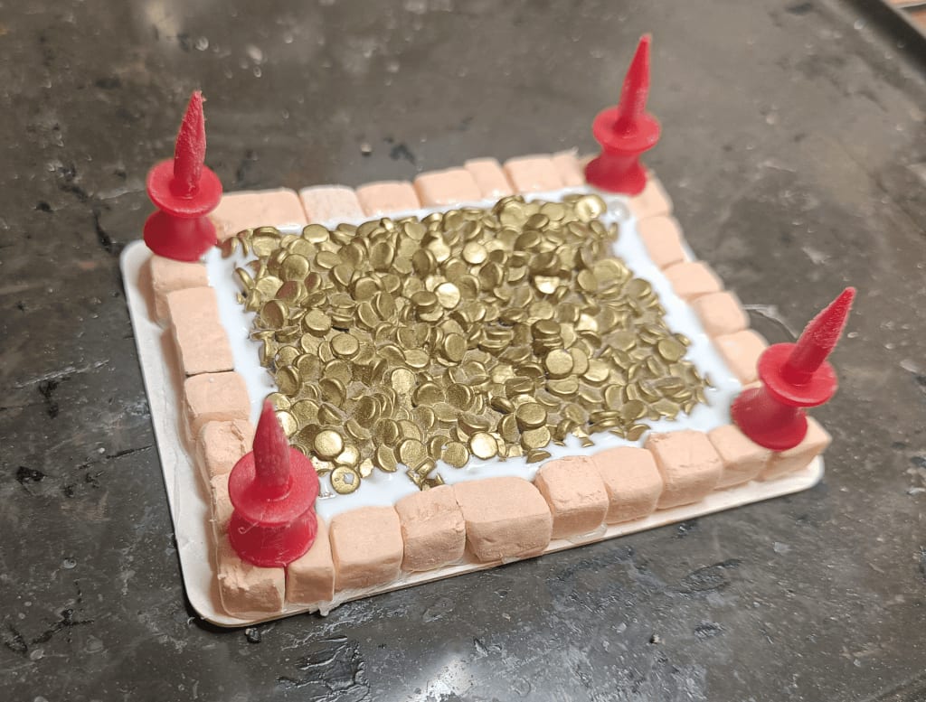 Foam bricks and kids golf markers added as flames