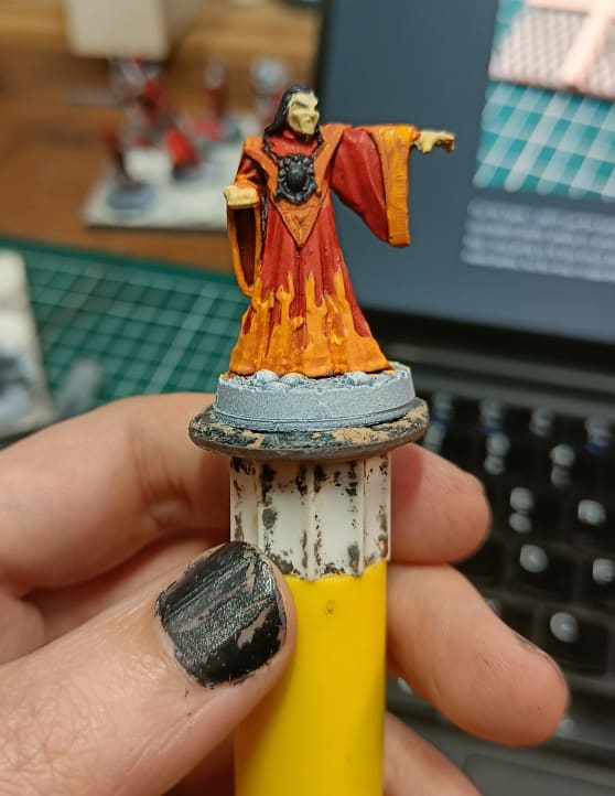 Fire wizard painted red base before yellow details showing coverage issues