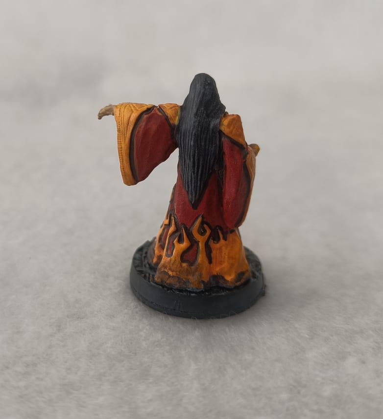 Fire wizard with black marker outlining on contours and details