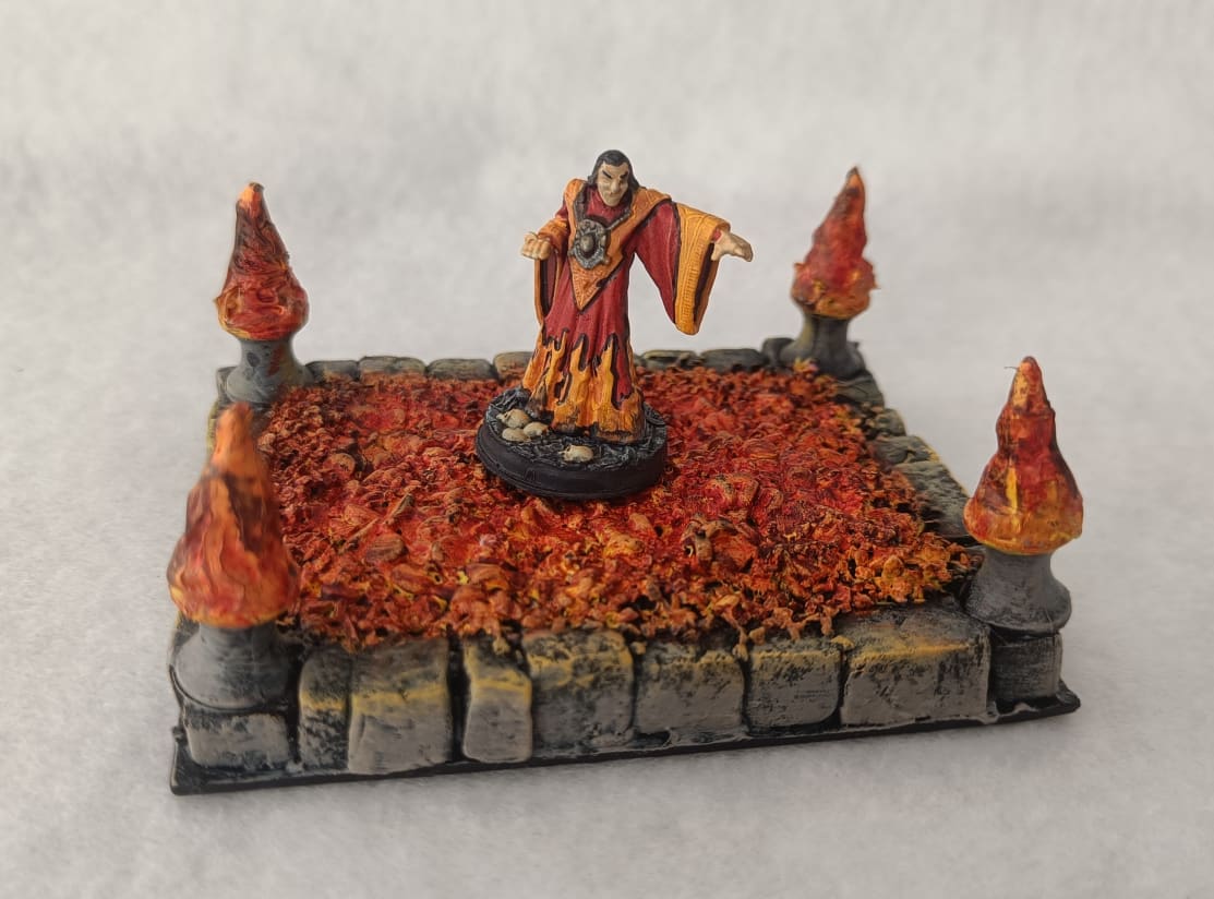 Fire wizard positioned on burning coals flame terrain
