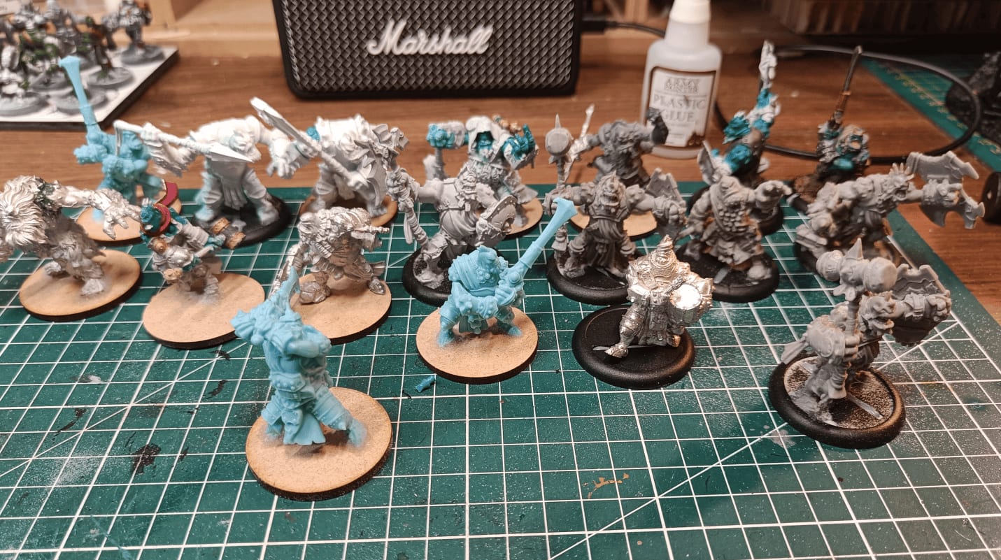 Mixed gray plastic, blue plastic, and metal miniatures from flea market