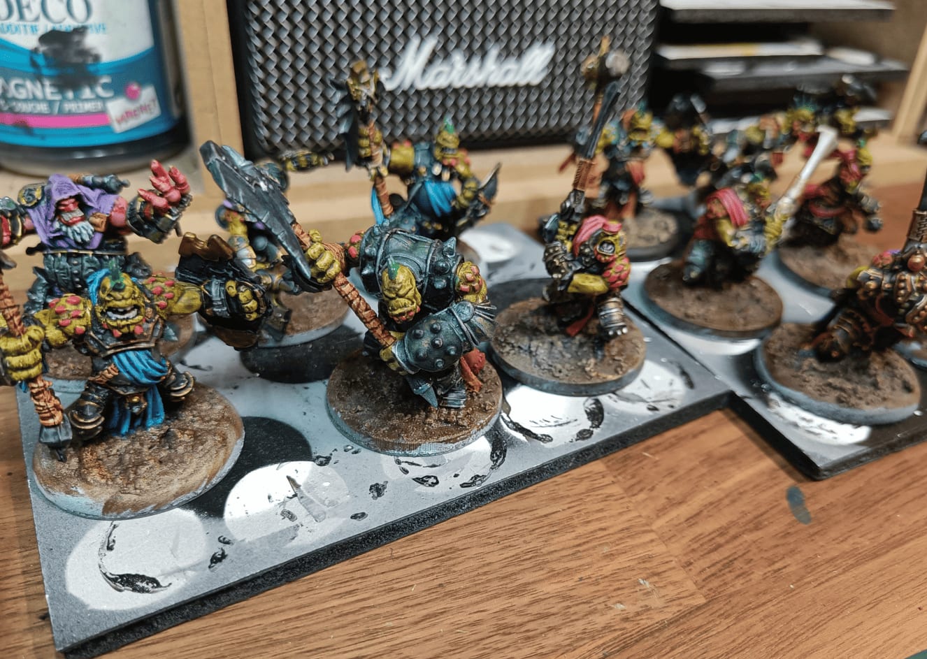 More finished miniatures showing silver armor with green speedpaint tint