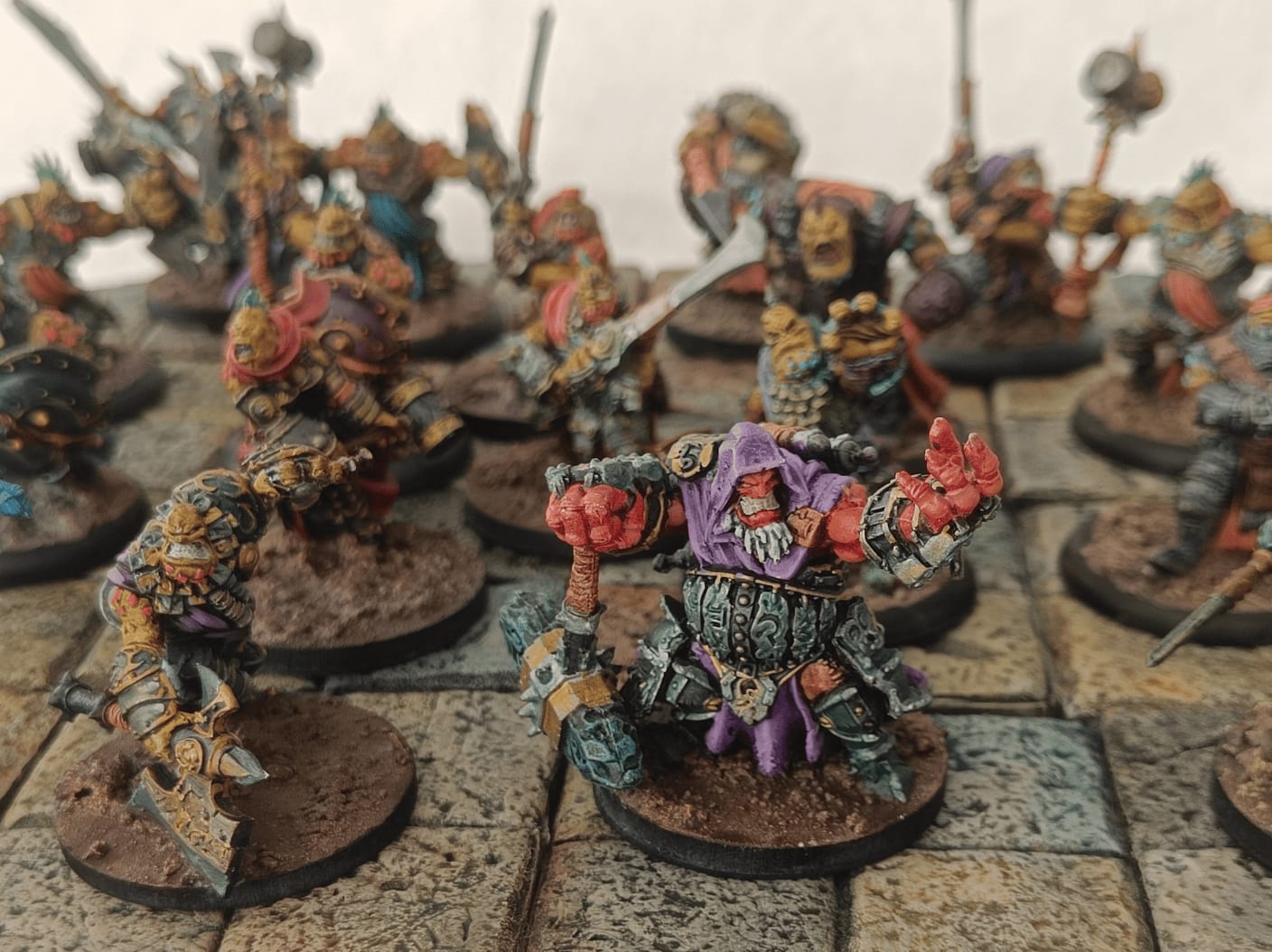 Shaman with pink edge highlights on hood and robe