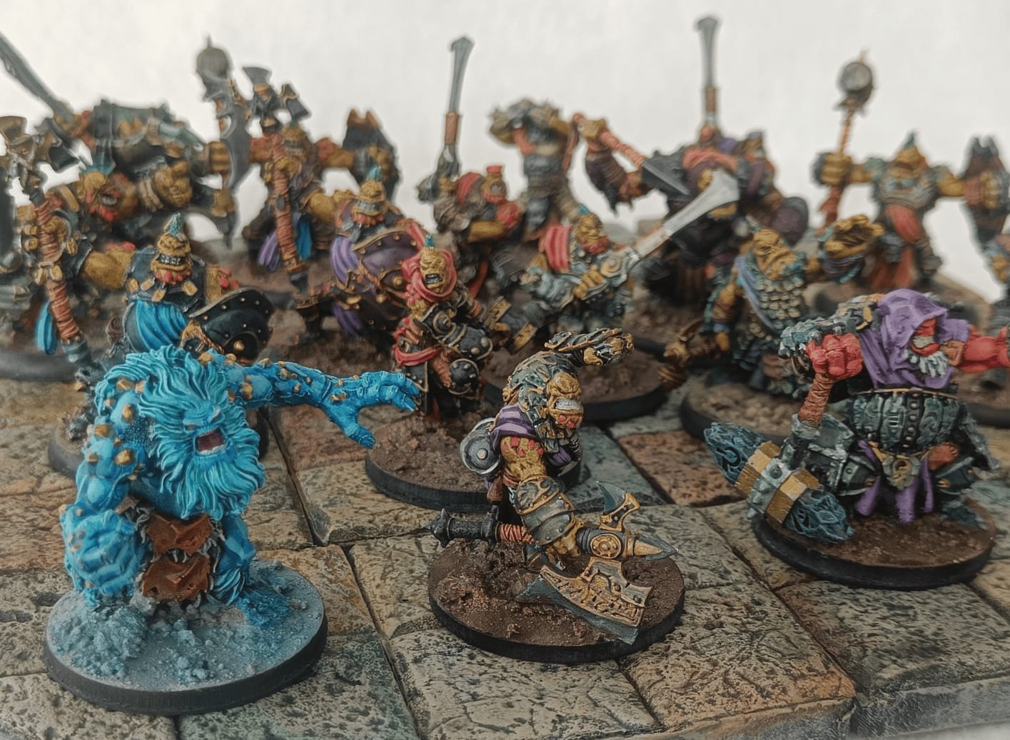 Group showing uniformity through skin color and diversity through varied robes