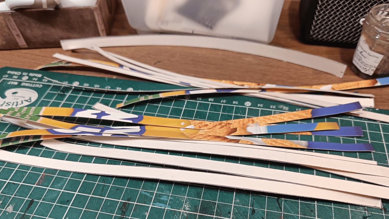 Cardboard strips cut from cereal box