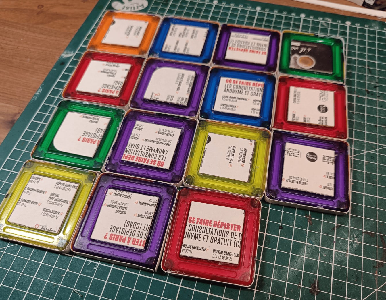 Tiles with cardboard edging strips glued around perimeter