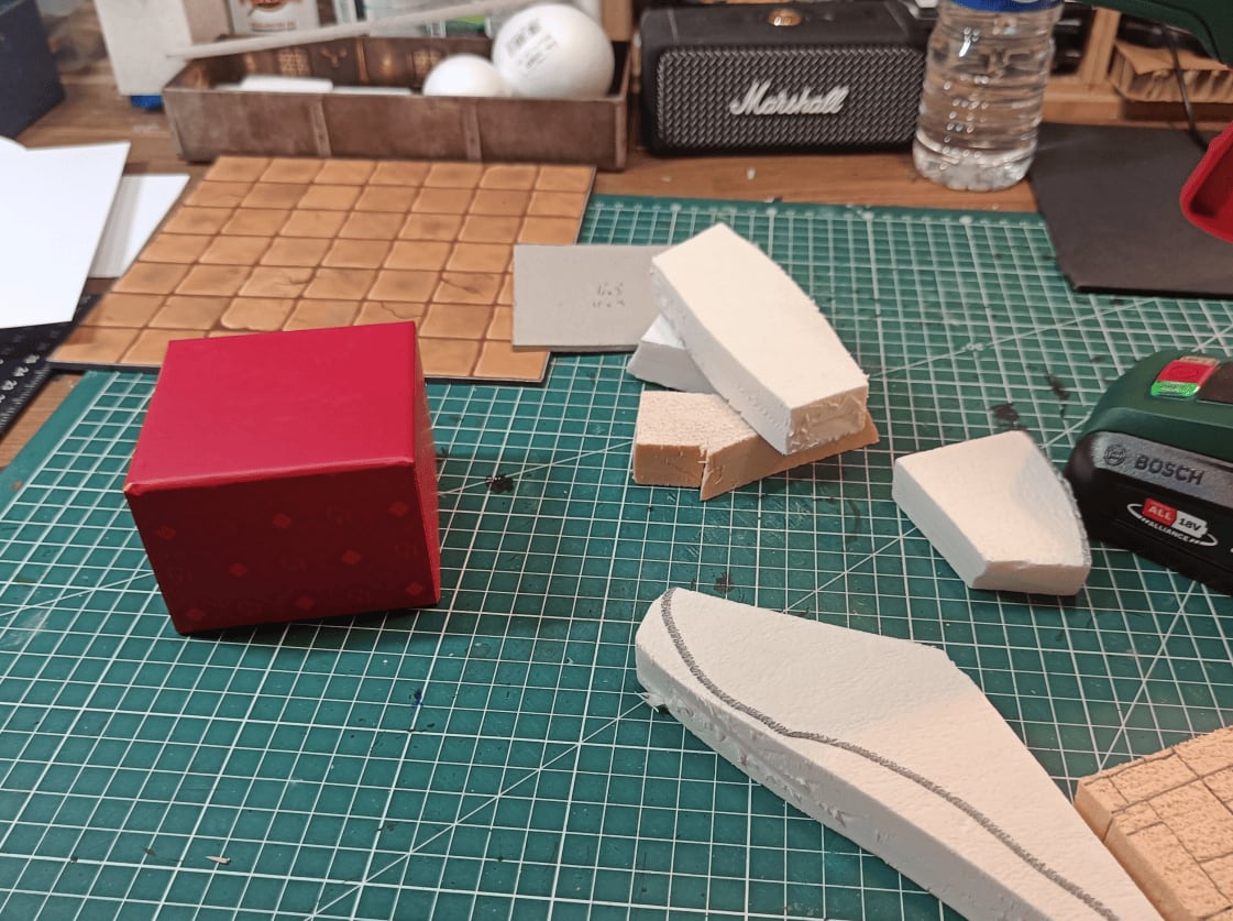 Cardboard boxes used as base material for cubic house shapes