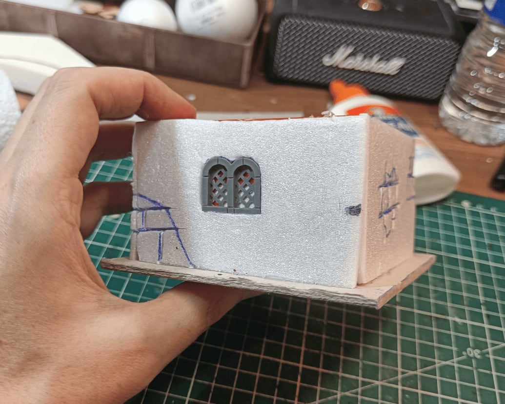 Back view of house showing windows on multiple sides