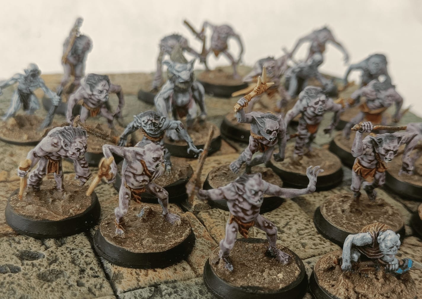 Group with Heroclix mole man monster and forest goblin from board game