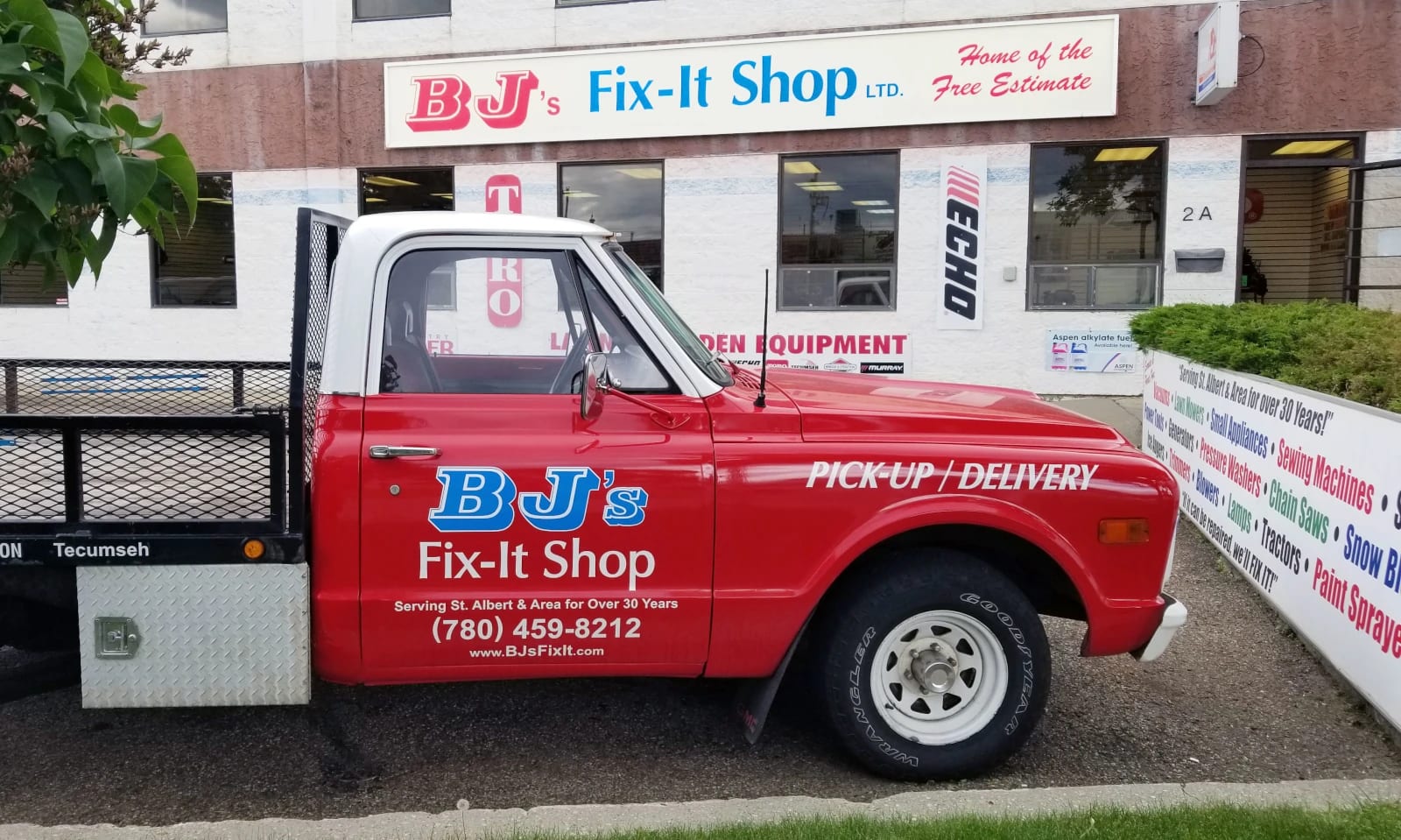 Our store front photo with the BJ's Fix-it Shop Logo and our red delivery truck.