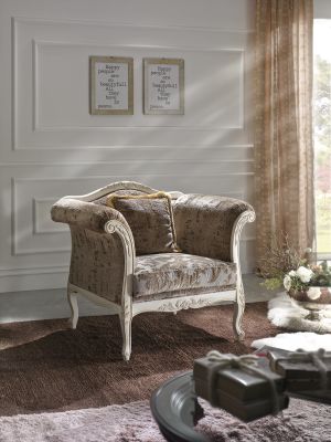 Armchair with shaped headboard