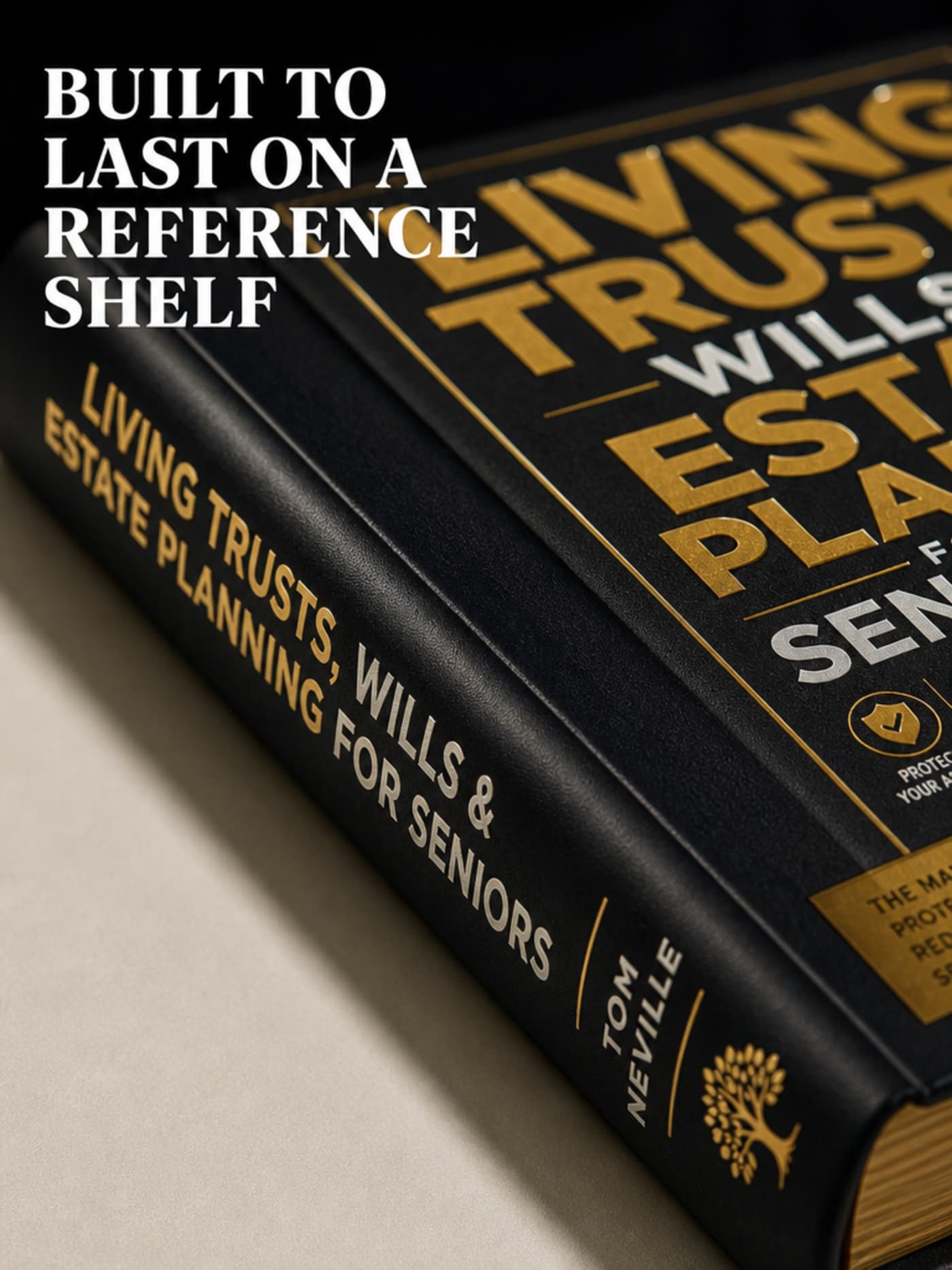 Close-up macro photograph of the hardcover edition's spine and front board — premium binding, gold embossed titling, real paper texture visible along the page edges