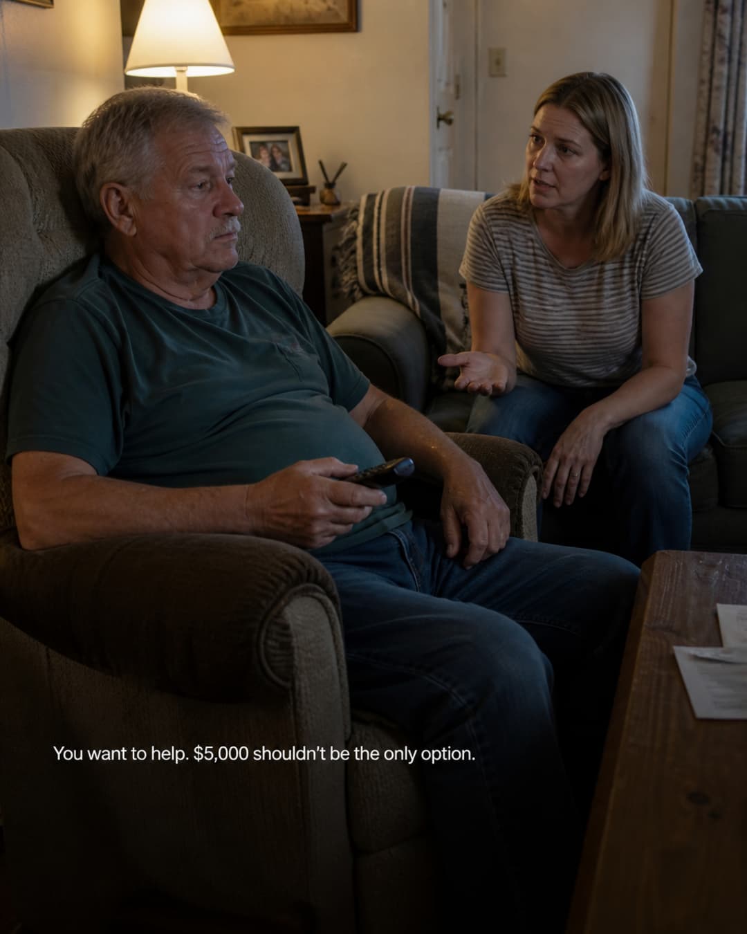 Illustrative living-room scene with an older father and his adult daughter