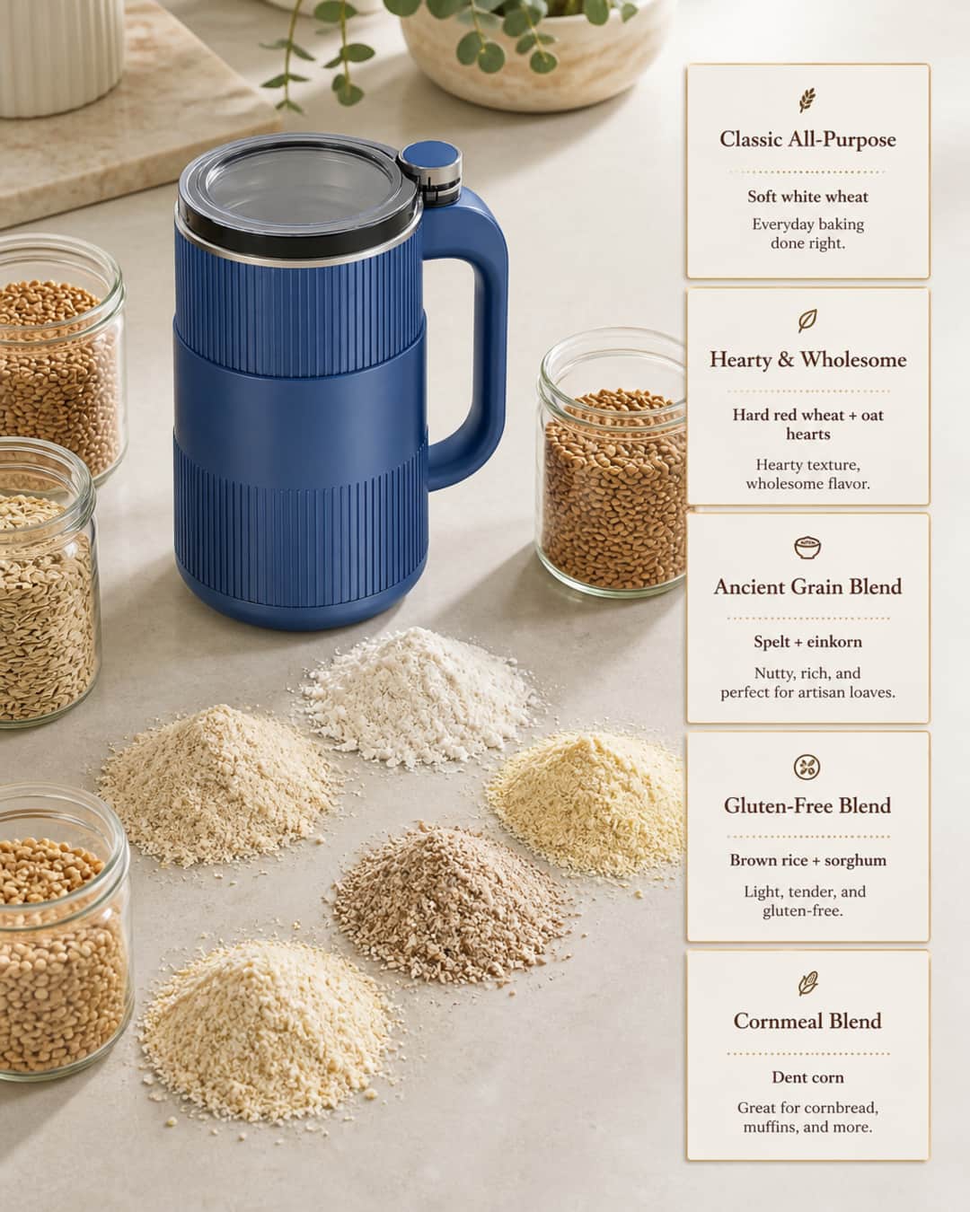 GRAIN BLOOM mill on a kitchen counter with jars of whole grains, piles of freshly milled flour, and cards for custom blend ideas