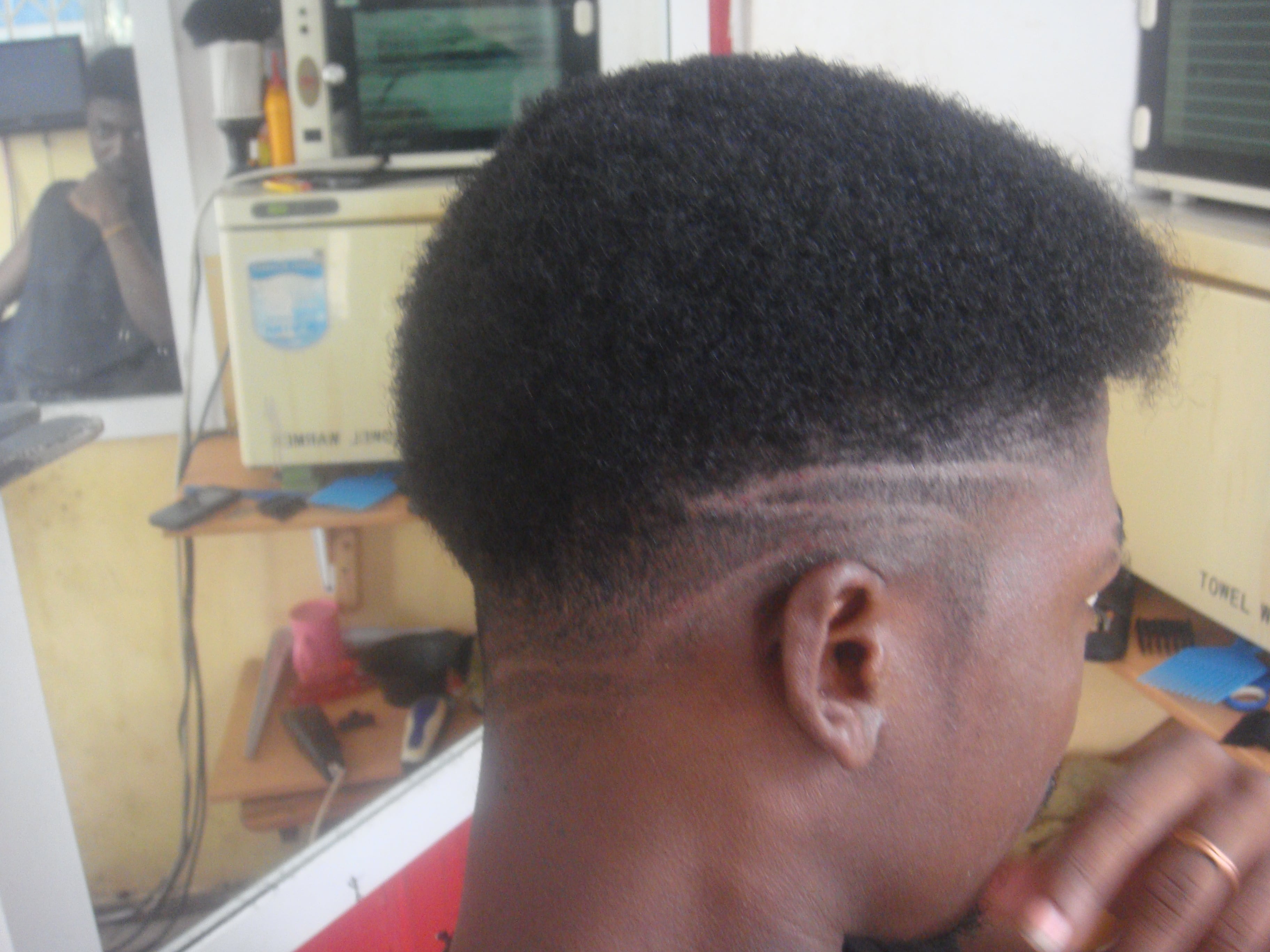 beauty salon in Ghana, haircut three