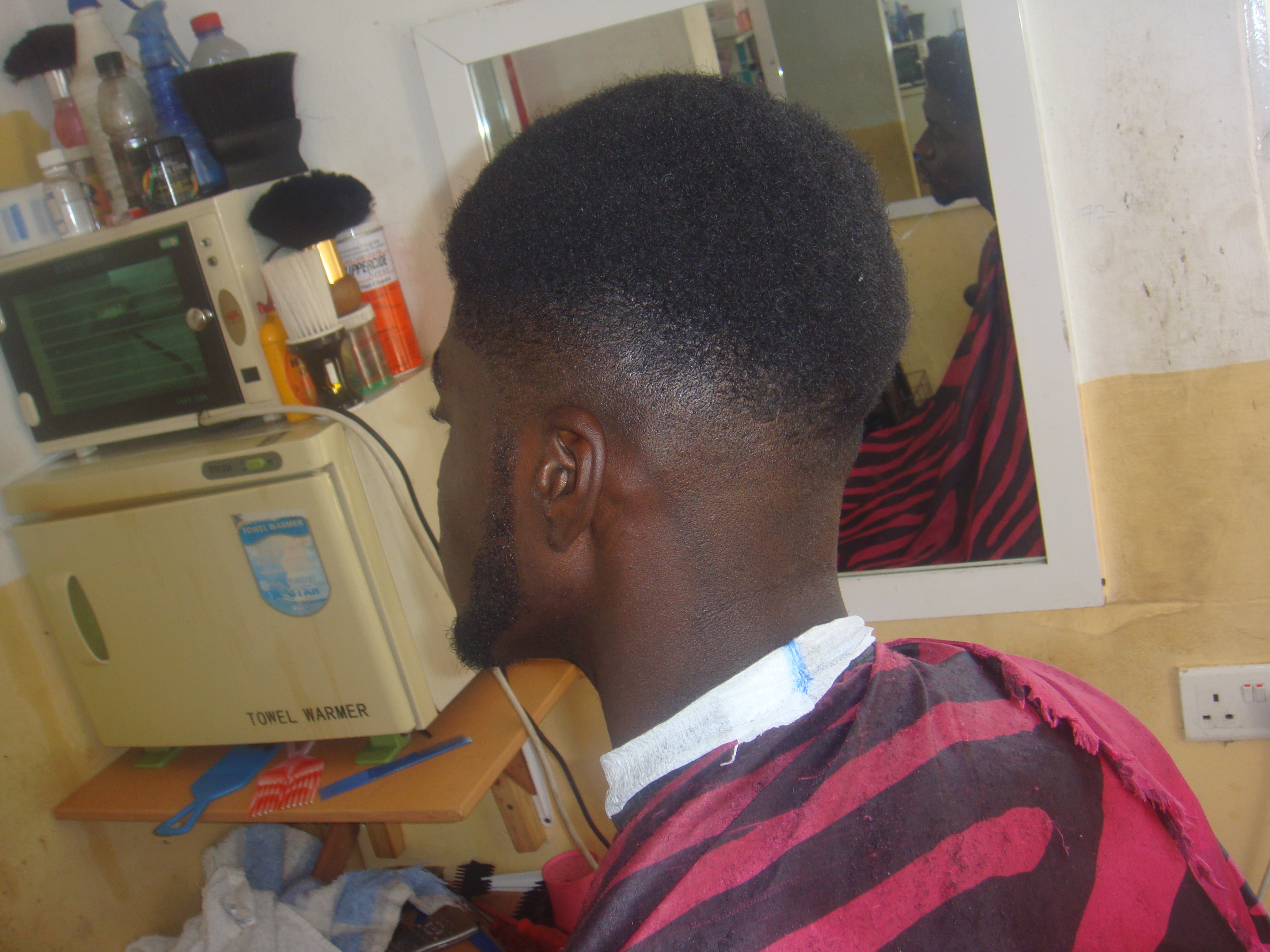 beauty salon in Ghana, haircut four