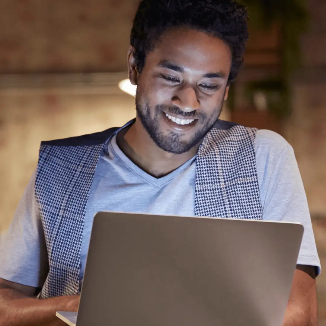 Social Media Tools Thumbnail Displaying A Man Working On His Laptop