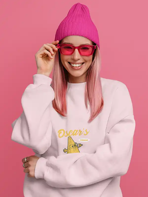 Sweatshirt Mockup Featuring A Pink Haired Woman Smiling At A Studio 
