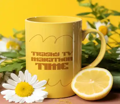 AI-Generated Mockup Featuring a Coffee Mug Surrounded by Flowers and a Lemon Slice