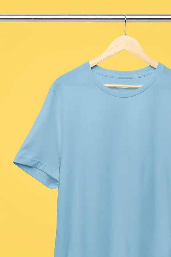 Professional Mockup of an Ocean Blue Bella Canvas 3001 T-Shirt on a Hanger With a Cheerful Yellow Background
