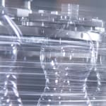 100,000 bottles per hour