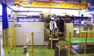 Robotized cells for manufacturing automotive parts 