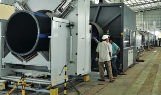 First  2,000 mm pipe extrusion line with internal cooling system in Asia