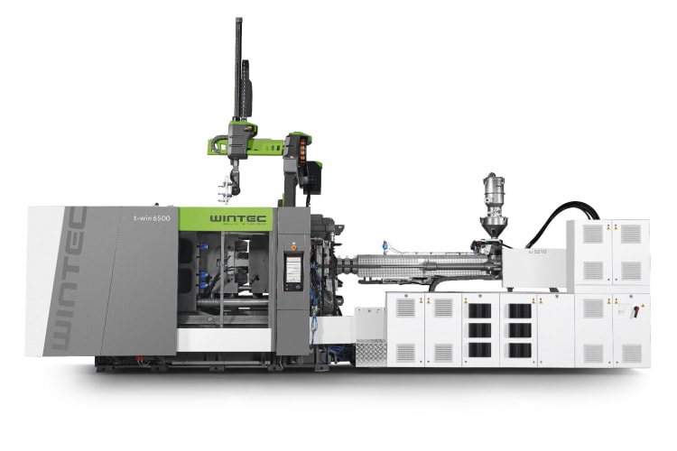 Dwupłytowa wtryskarka Wintec t-win 6500 ze zintegrowanym robotem liniowym viper 20 umożliwia ekonomiczną produkcję wielkogabarytowych komponentów przy krótkich czasach cyklu.