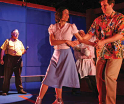 Actors Guy Boyd, Heather Goldenhersh, Joel Marsh Garland, Paul Sparks, and Michael Chernus in Essential Self-Defense. Goldenhersh and Garland dance together.