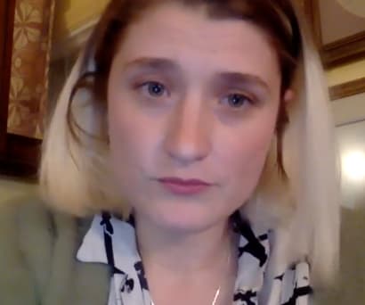 Composer and singer Heather Christian, a white woman wearing a green cardigan and a white and black collared shirt, leads a virtual Master Class.