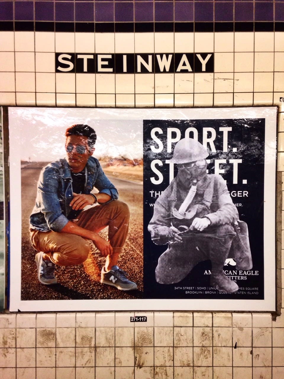 Image of an early 20th century soldier, crouching while wearing a gas mask, is pasted over the right side of an American Eagle ad. On the left side the same ad, a young male model crouches in front of a scenic road on the highway.