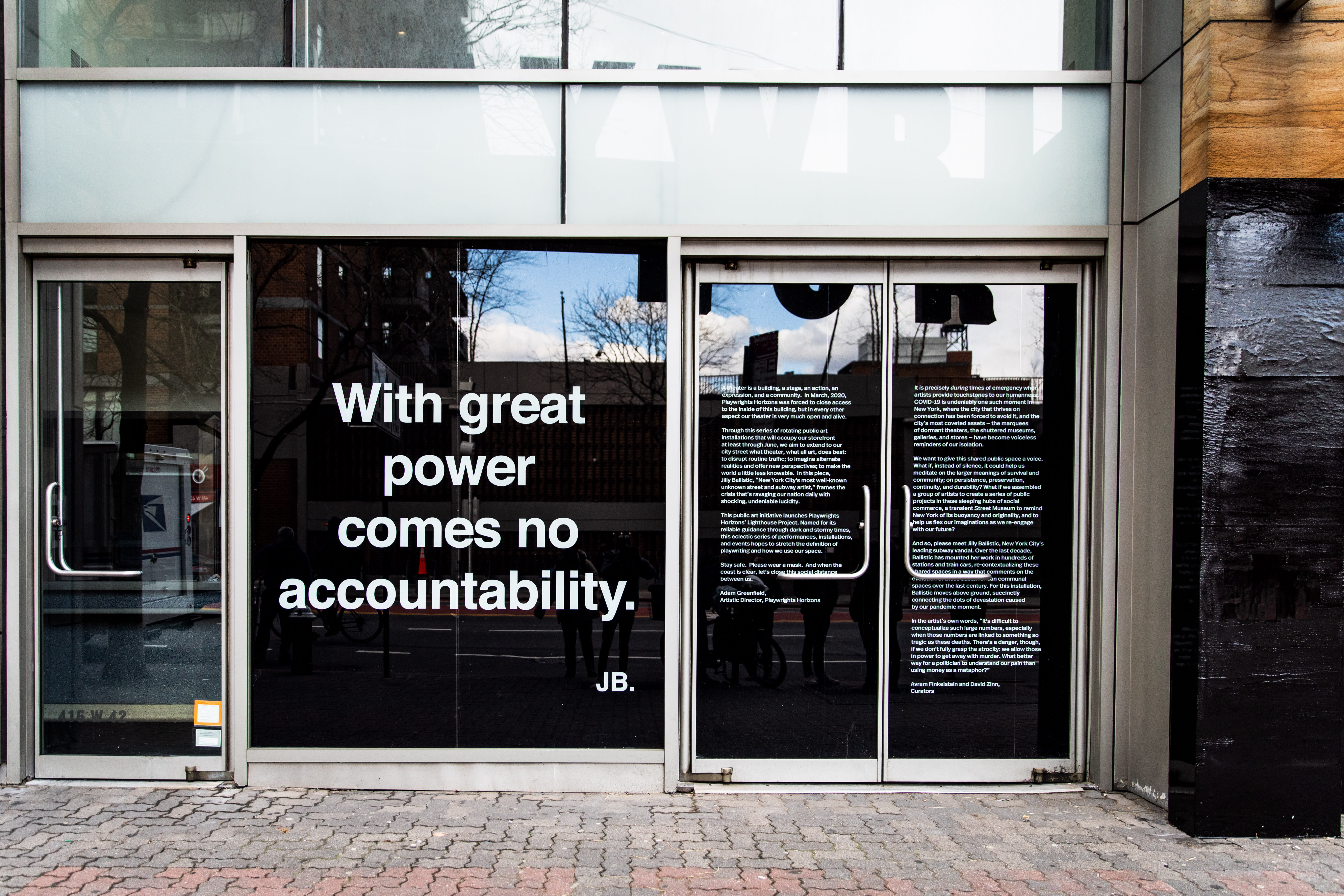 Image of an early 20th century soldier, crouching while wearing a gas mask, is pasted over the right side of an American Eagle ad. On the left side the same ad, a young male model crouches in front of a scenic road on the highway.