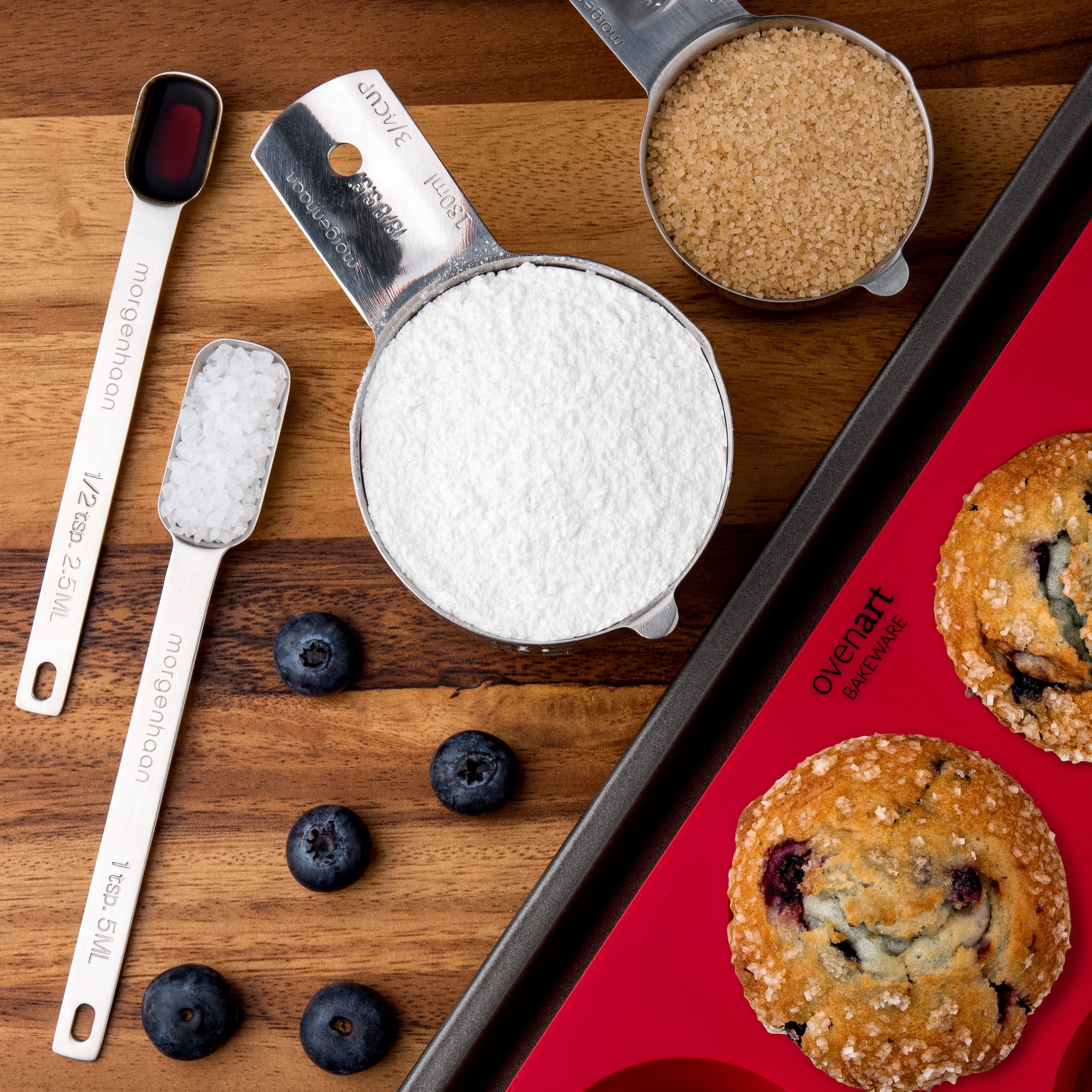 Measuring cups, measuring spoons and muffin tray