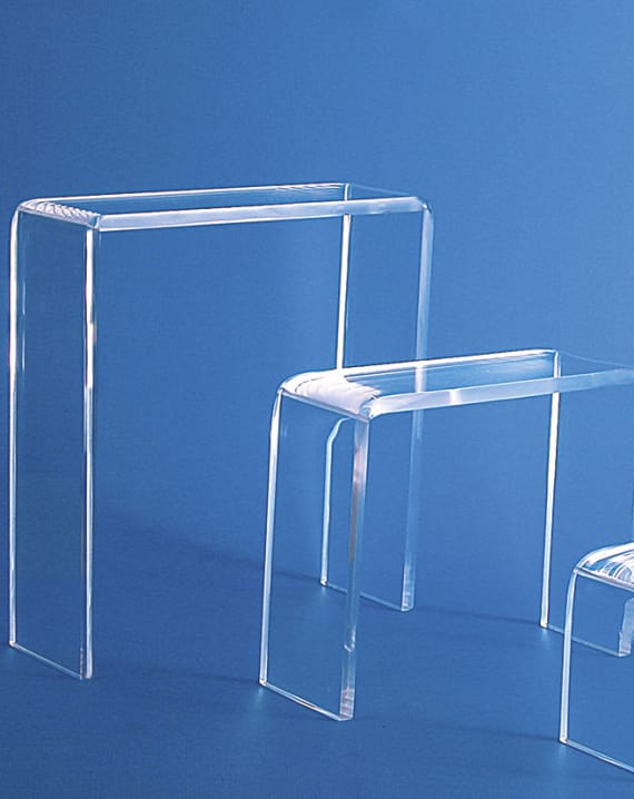 Three plexiglass tables