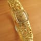 Omega Gilbert Albert-Set Frisson d'Or: Naturalistic Bracelet Ladies-Watch & Brooch