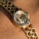 Omega Ladies Gilbert Albert: Linen-Dial, Natural-Design & Integrated Bracelet Maille d'Or