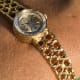 Omega Ladies Gilbert Albert: Linen-Dial, Natural-Design & Integrated Bracelet Maille d'Or