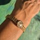 Omega Ladies Gilbert Albert: Linen-Dial, Natural-Design & Integrated Bracelet Maille d'Or