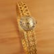 Omega Ladies Gilbert Albert: Linen-Dial, Natural-Design & Integrated Bracelet Maille d'Or