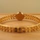 Omega Ladies Gilbert Albert: Linen-Dial, Natural-Design & Integrated Bracelet Maille d'Or