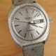 Universal Geneve UniQuartz: Early Quartz Beta21++, AccuQuartz Day-Date Snowflake