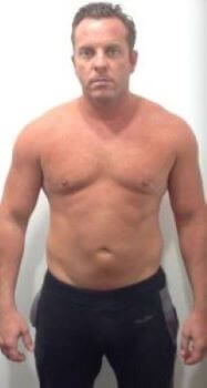 an image of a man posing with out a top on