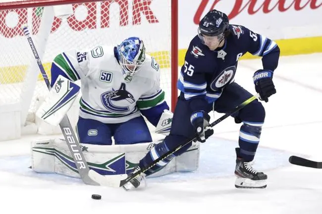 Canucks at Jets 1/14/20 - NHL Picks & Predictions