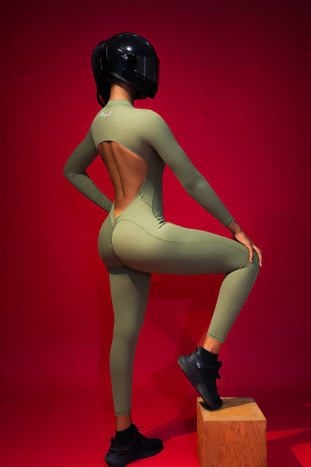 Monalisa SculptFit Romper, back view, campaign shot with helmet