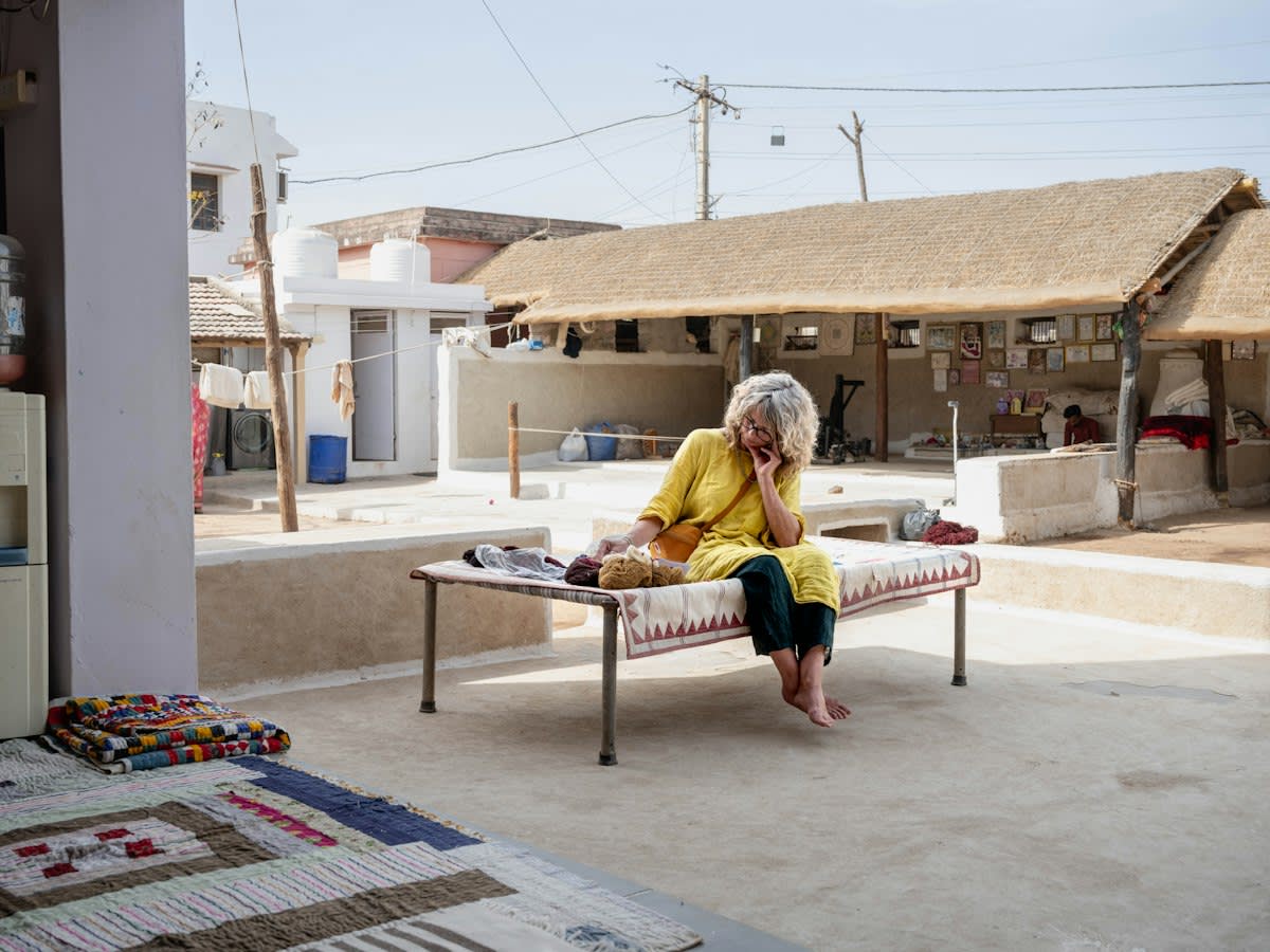 A weaver's yard in Bhujodi — most workshops are family homes, open to careful visitors